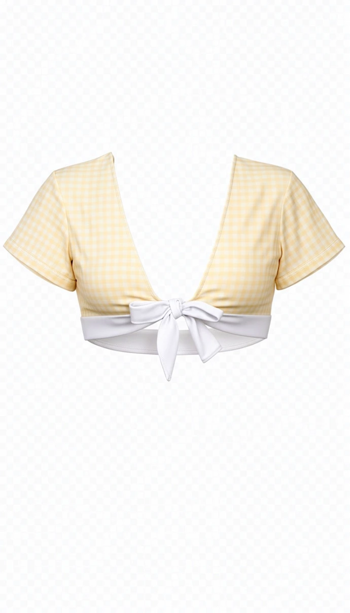 Golden, girly, and sunshine-ready, the Elya Honey Mirage crop bikini features a soft pastel gingham design with white front tie straps, offering a flattering fit and a warm, elegant touch to your beach style.