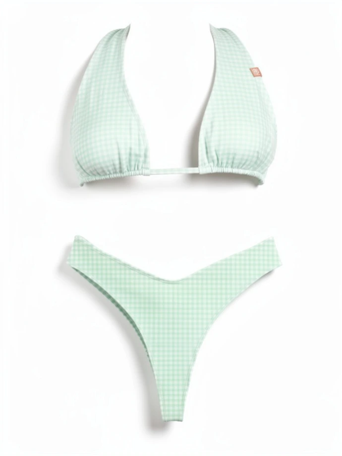 Ghost photo of the Aalyia bikini top and Roxy bottom in Green Mirage, featuring a pastel green and white gingham pattern, highlighting a flattering fit and soft, feminine summer style.